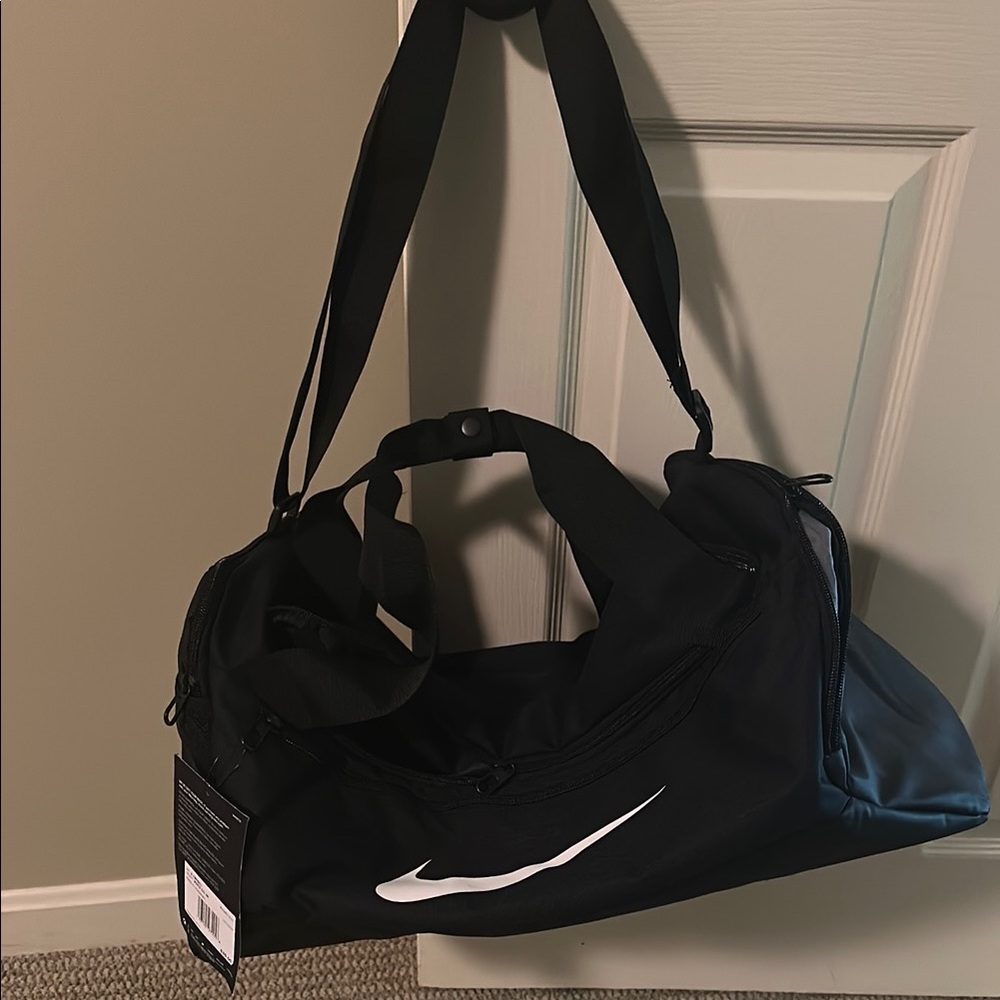 Nike Black Travel Bag with Versatile Straps